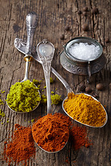 Image showing various spices on a dark background