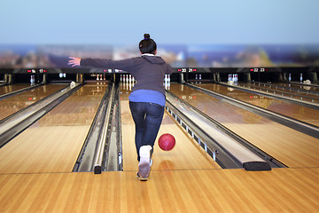 Image showing Young girl playing bowling