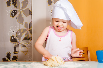 Image showing baby girl in cook role