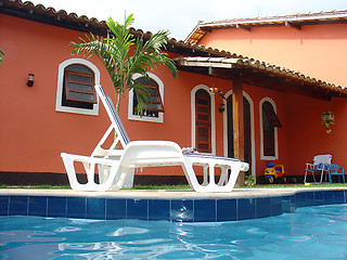 Image showing Red house with swimming pool