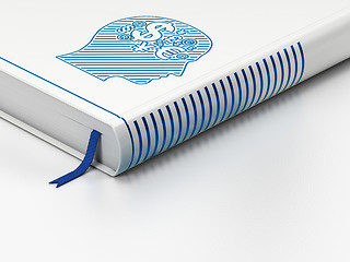 Image showing Business concept: closed book, Head With Finance Symbol on white background
