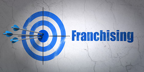 Image showing Business concept: target and Franchising on wall background