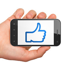 Image showing Social network concept: Thumb Up on smartphone
