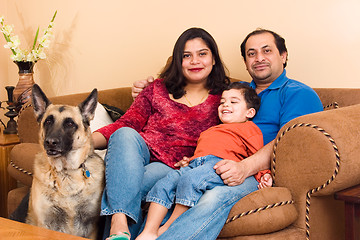 Image showing East Indian Couple with their son and dog