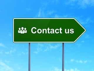 Image showing Marketing concept: Contact Us and Business People on road sign background