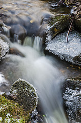 Image showing Small creek with a waterfall close up