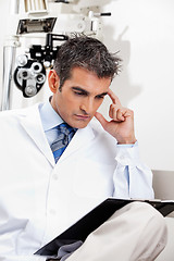 Image showing Serious Optometrist At Work