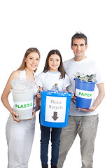 Image showing Family Holding Recycle Bin