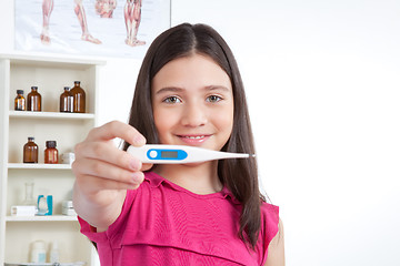 Image showing Girl Showing Thermometer in Clinic