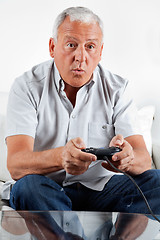 Image showing Senior Man Playing Video Game