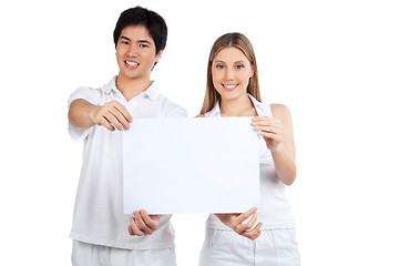 Image showing Young Couple  Holding Blank Placard