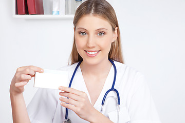 Image showing Doctor Holding a Medicine Packet