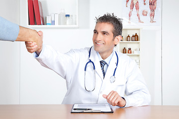 Image showing Doctor And Patient Shake Hands