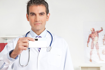 Image showing Doctor Holding a Medicine Packet