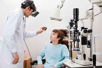 Image showing Boy Undergoing Dilated Retinal Exam