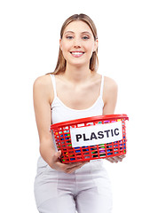 Image showing Woman Holding Red Basket