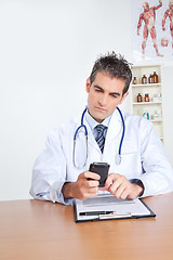 Image showing Male Doctor Using Mobile Phone