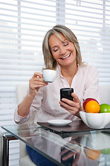 Image showing Mature Woman Using Phone