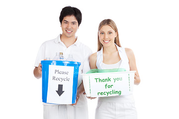 Image showing Young Couple  Holding Recycle Bin