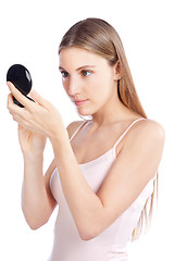 Image showing Woman Looking at Compact Mirror