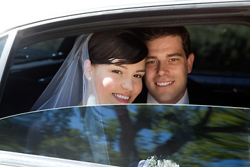 Image showing Wedding Couple in Limousine