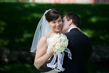 Image showing Newlywed Couple Kissing