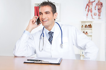 Image showing Male Doctor Using Mobile Phone