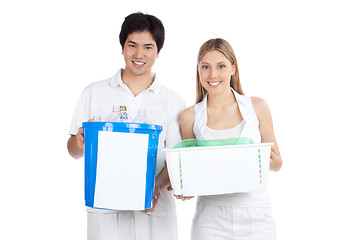 Image showing Young Couple  Holding Recycle Bin