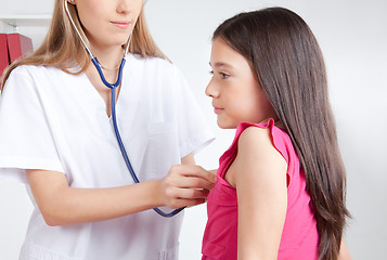 Image showing Doctor Examining Child in Clinic