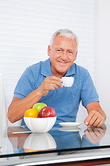 Image showing Senior Man Having Cup of Tea