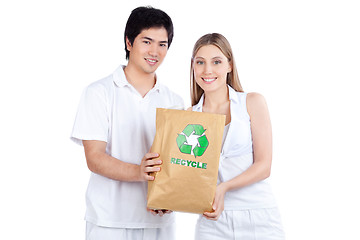 Image showing Young Couple  Holding Paper Bag