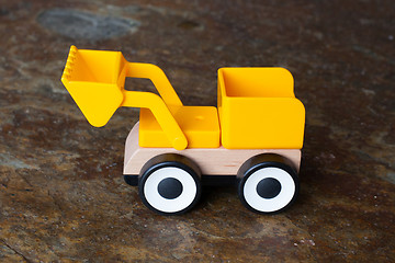 Image showing Simple wheel dozer toy