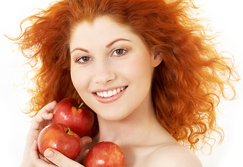 Image showing happy redhead with red apples