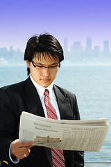 Image showing Reading businessman