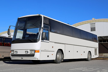 Image showing White Coach Bus on a Bus Stop