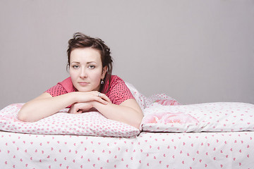 Image showing young girl is sad one in bed