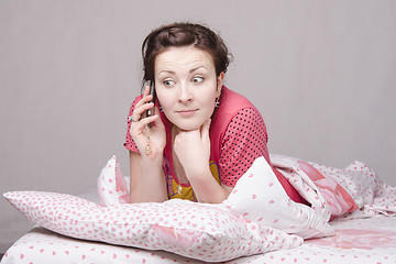 Image showing girl in shock from talking phone
