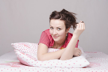 Image showing Young beautiful girl in bed