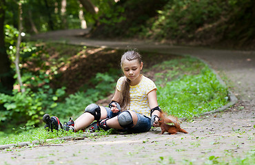 Image showing Rollergirl and squirrel
