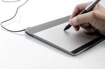 Image showing Hand writing on a touch pad