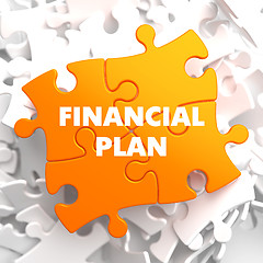 Image showing Financial Plan on Orange Puzzle.