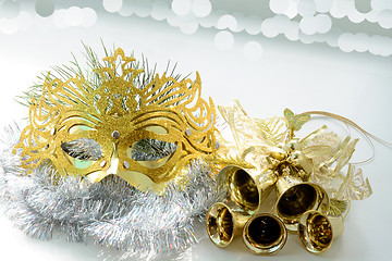 Image showing Carnival mask and golden bells