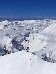 Image showing Snowy plateau and off-piste slope