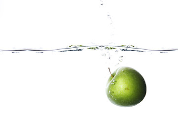 Image showing drowning apple