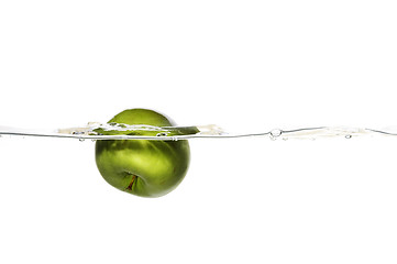 Image showing drowning apple