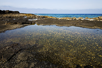 Image showing coastline in lanzarote spain pond   cloud beach  water  musk   