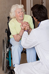 Image showing Doctor with Patient on Wheel Chair