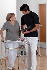 Image showing Patient with Walker and Physician
