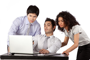 Image showing Businessman and Businesswoman Using Laptop