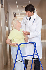 Image showing Doctor and Woman with Zimmerframe